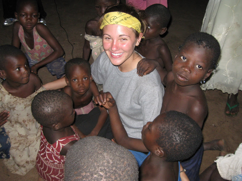 Bethany loves on the Ghanaian children